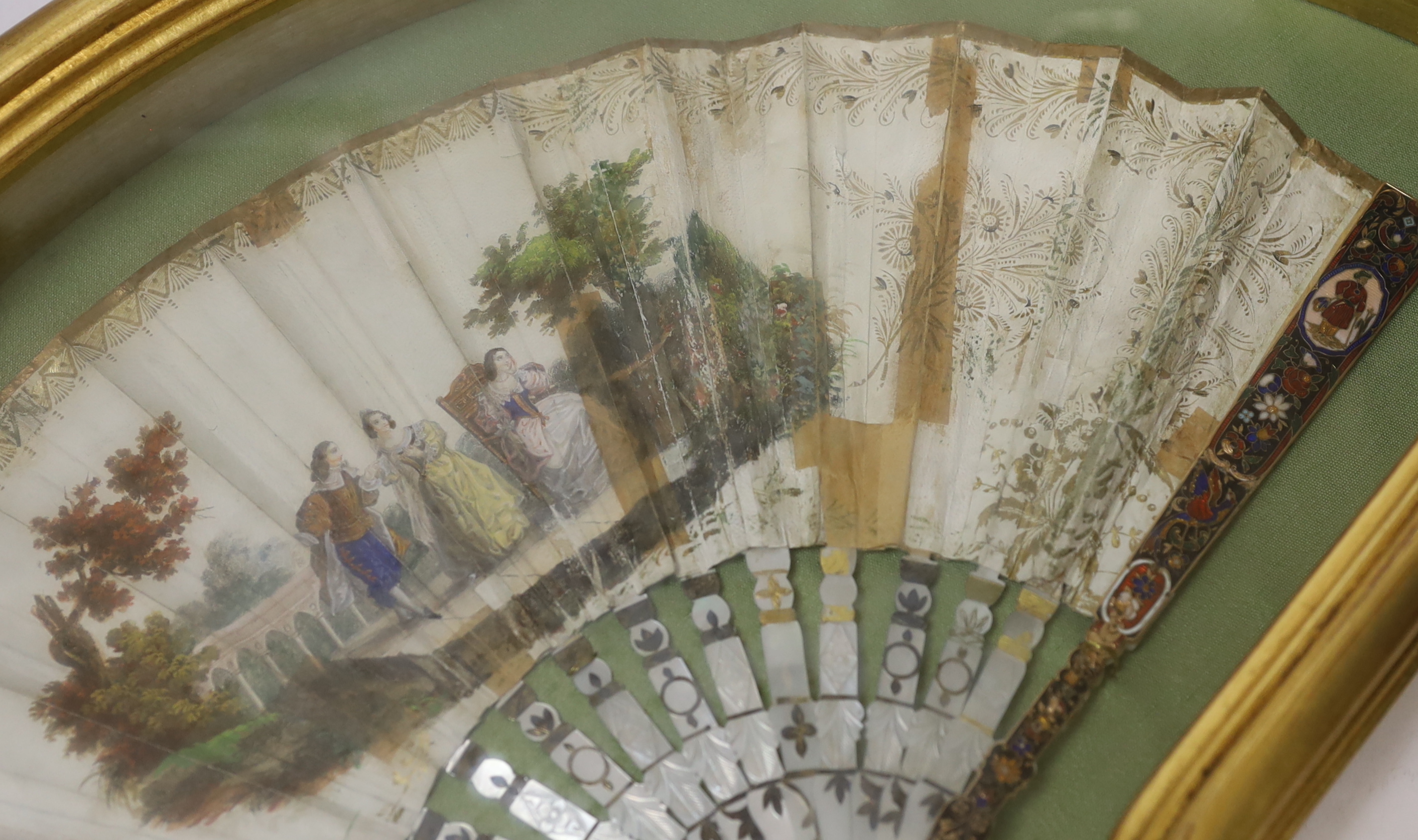 A cased early 19th century French mother of pearl, printed and painted fan